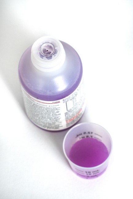 Liquid medicine bottle and dosing cup with medicine from top