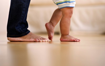 parent and baby feet