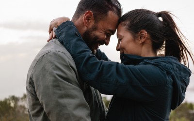 Couple hugging outdoors Couple hugging outdoors
