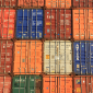 blue and orange stacked shipping containers