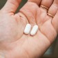 Acetaminophen tablets in hand