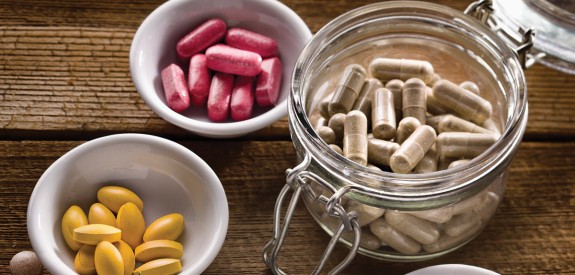 three different kinds of dietary supplement capsules
