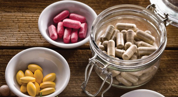 three different kinds of dietary supplement capsules