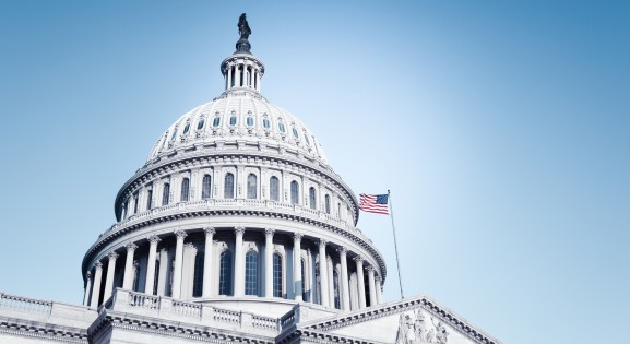 three quarter view of U.S. capitol building from below