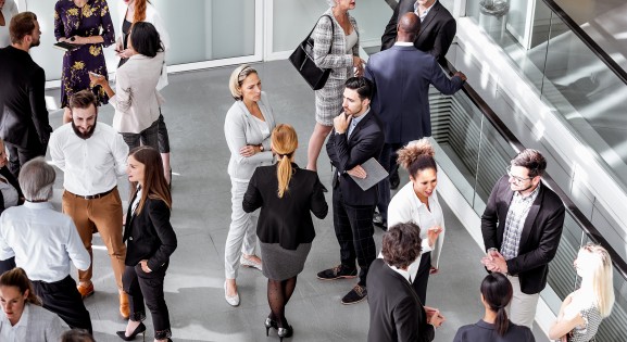 Small groups networking at a business conference